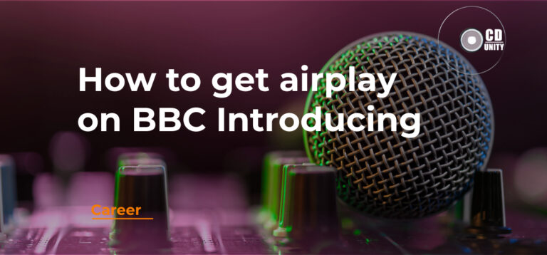 Close-up of a microphone on a mixing console with the text "How to get airplay on BBC Introducing" and a CD Unity logo in the background.