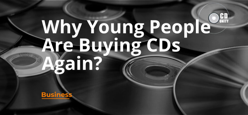 Why Young People Buys CDs Again 5 Stack of compact discs with the text “Why Young People Are Buying CDs Again?” in large letters and “Business” in orange below.